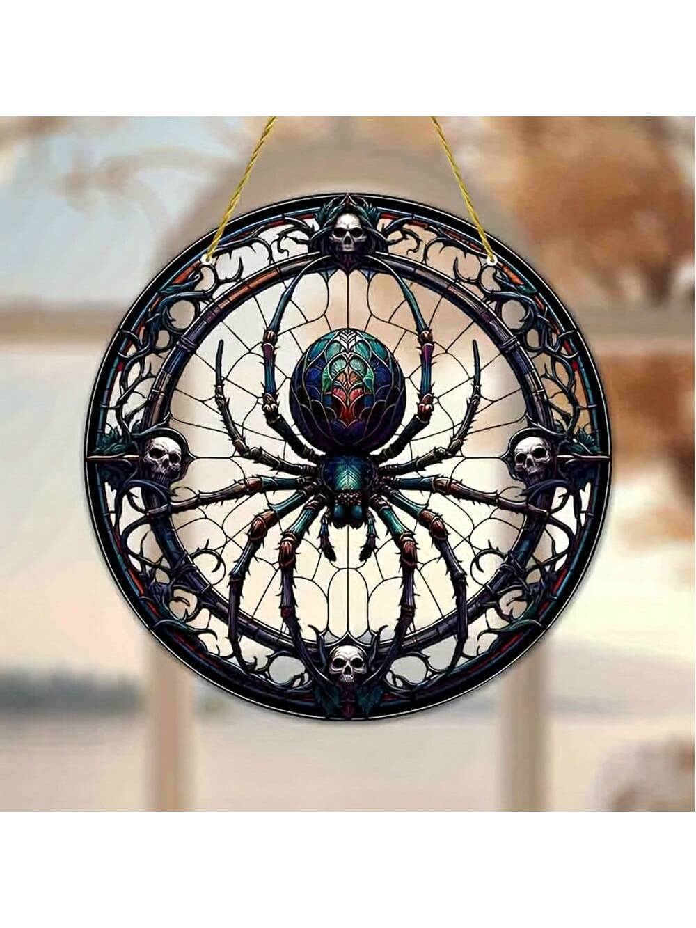 This unique Halloween window decor features spiders and skeletons on a stained glass suncatcher. Add a touch of spooky elegance to your home for the holiday season. Crafted with quality materials, this suncatcher will provide a stunning Halloween display for years to come.