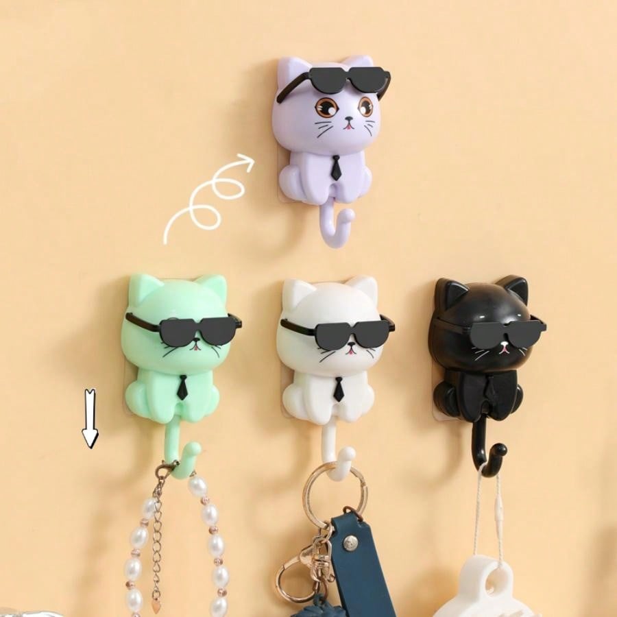 The Whimsical Cat Adhesive Hook is not only cute with its Macaron color, but also highly functional. With strong adhesion, it's perfect for hanging anything from keys to towels. Keep your space organized with this fun and practical hook.