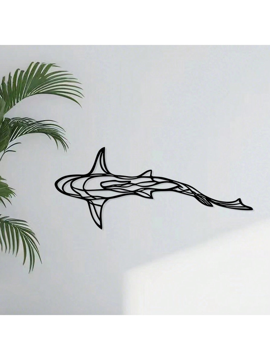 Elevate your home or office space with our stylish and minimalist iron decor. This eye-catching metal shark wall art adds a unique touch to any room, making it the perfect hanging ornament. Made with durable materials, it's both functional and aesthetically pleasing. Enhance your decor with this modern accessory.