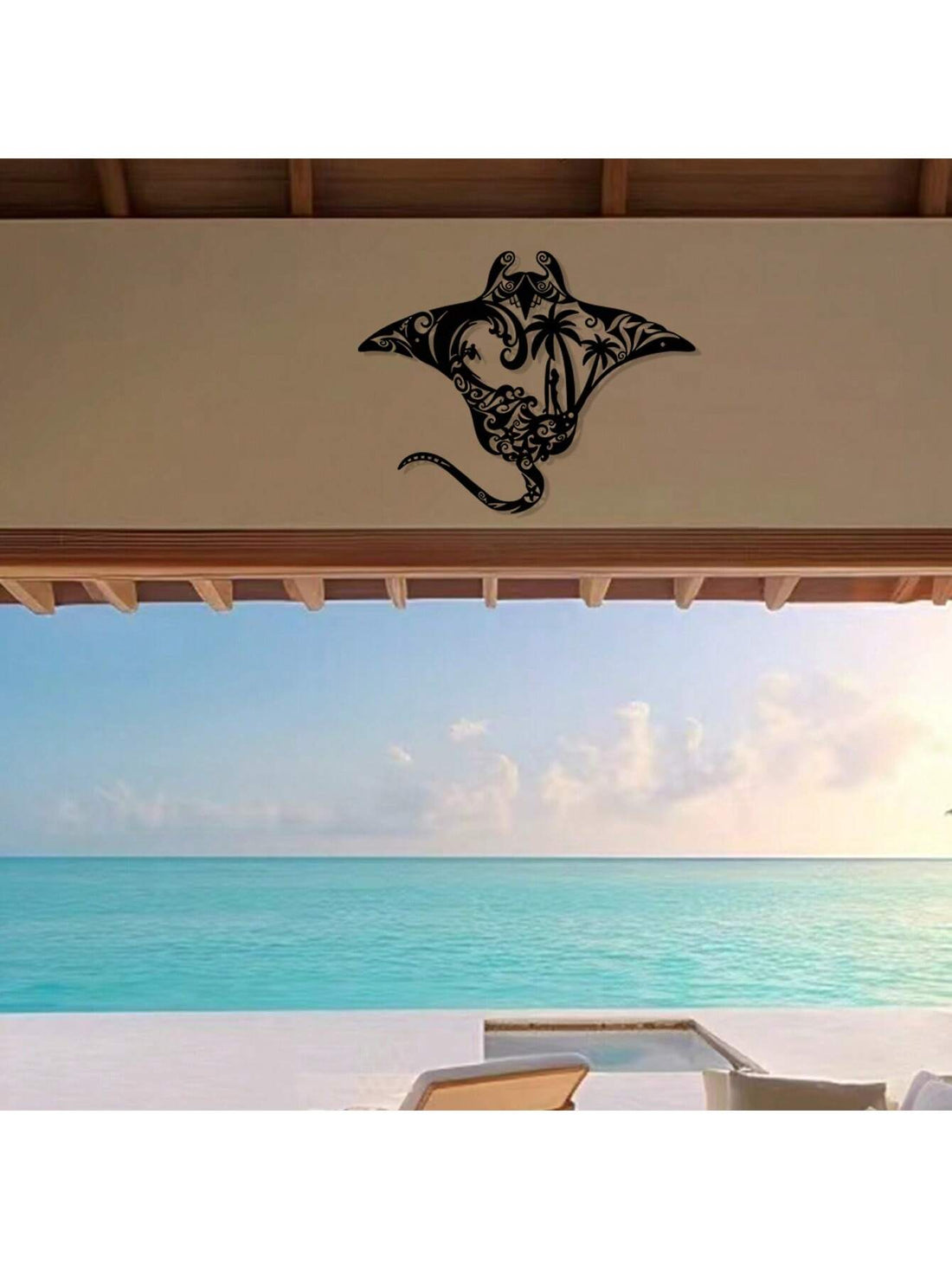 Enhance your beach decor with Oceanic Elegance's Metal Manta Ray Wall Art. Handcrafted with intricate details, this stunning hanging ornament brings the beauty of ocean life to your home. Made of sturdy metal, it adds elegance and charm to any wall. Transform your space with this unique piece of art.