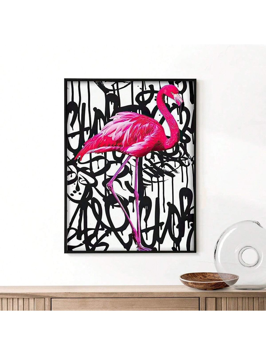 Add a touch of modern abstract charm to your home or office with our Vibrant Pink Flamingo Framed Wall Art. The bold and vibrant colors of the flamingo will bring a stylish and playful accent to any space. Made with high-quality materials, this framed art piece is sure to brighten up your surroundings.