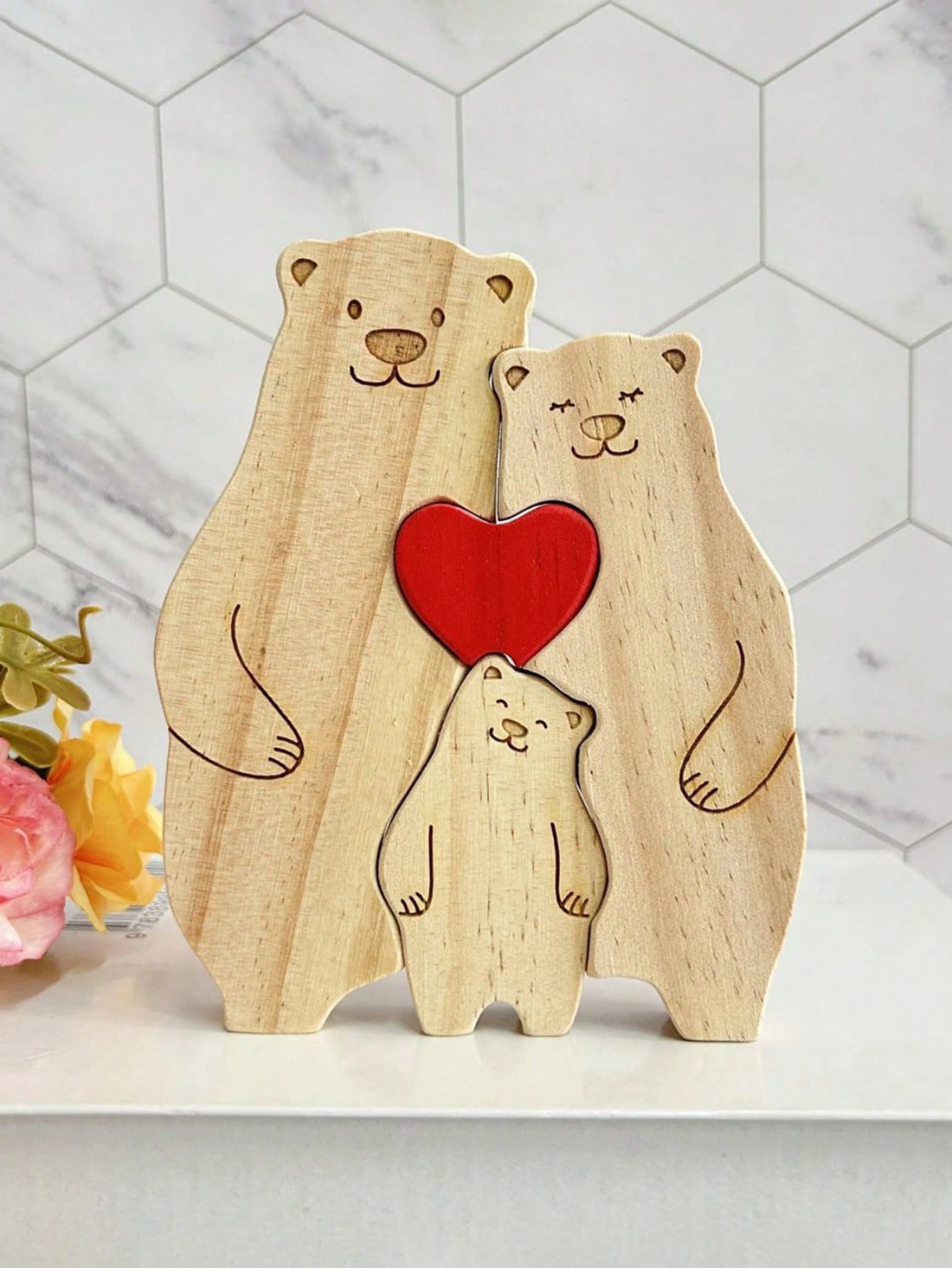 This personalized wooden bear family puzzle is the perfect keepsake and home decor gift. Crafted with precision and care, it features a charming bear family design that can be customized with your loved ones' names. Made with high-quality wood, this puzzle is not only a beautiful addition to any home, but also a fun and engaging activity for the entire family. A truly special and meaningful gift for any occasion.