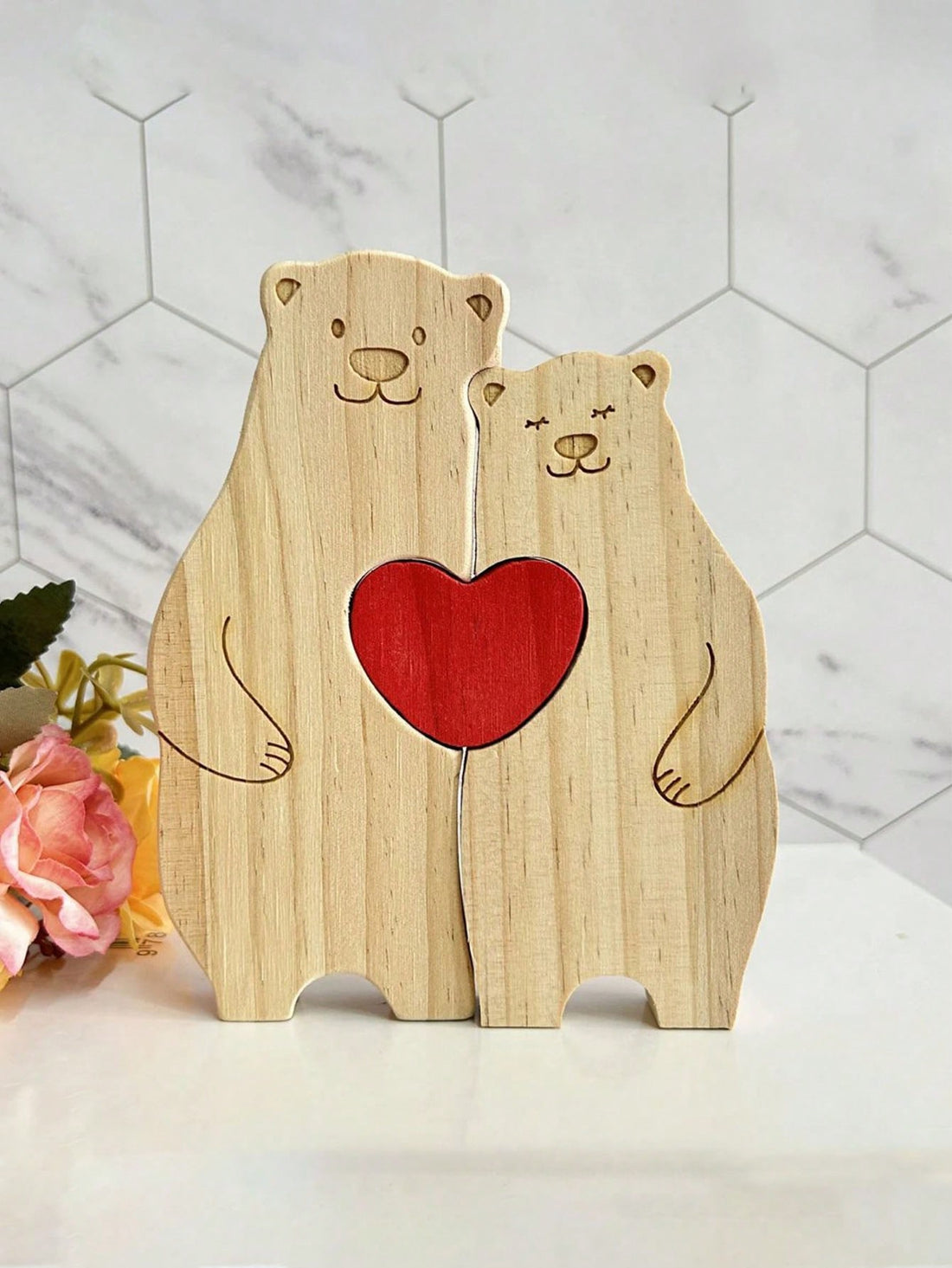 This personalized wooden bear family puzzle is the perfect keepsake and home decor gift. Crafted with precision and care, it features a charming bear family design that can be customized with your loved ones' names. Made with high-quality wood, this puzzle is not only a beautiful addition to any home, but also a fun and engaging activity for the entire family. A truly special and meaningful gift for any occasion.