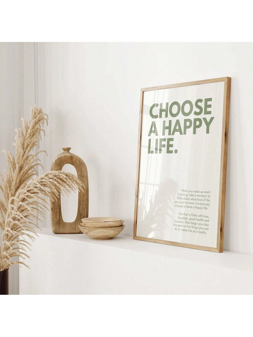 Transform your living space with this elegant "Choose A Happy Life" wall art. The inspirational quote, rendered in soothing green tones, serves as a daily reminder to embrace positivity. Professionally printed on premium canvas, this decorative piece adds both meaningful sentiment and sophisticated style to any room in your home.