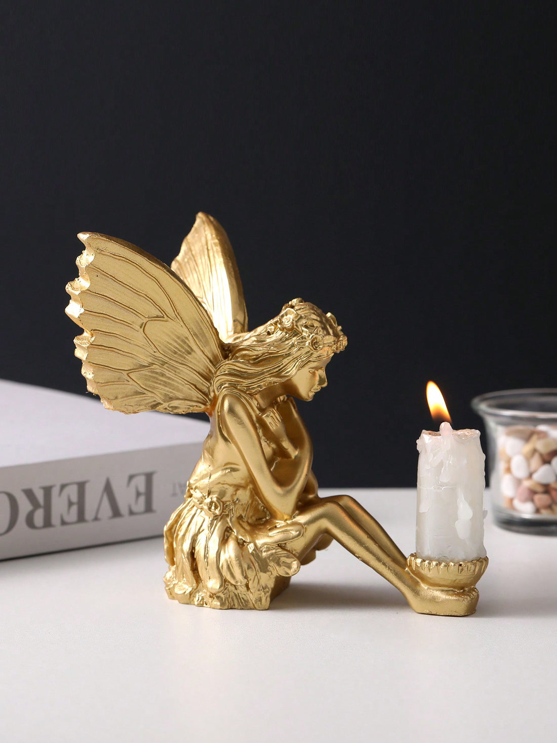 Add a touch of magic to your home with our Enchanting Fairy Resin Ornament. Handcrafted with detailed resin, this charming decoration captures the whimsical beauty of fairies. Perfect for bringing a sense of wonder and enchantment to any room.