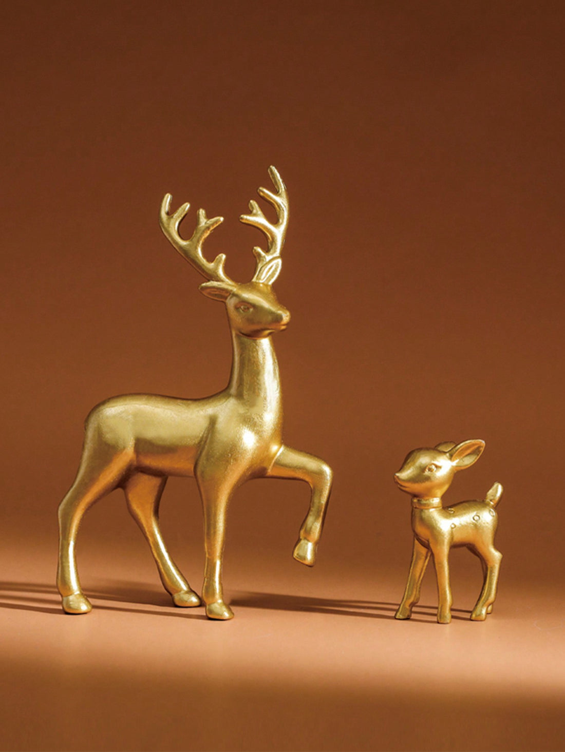 This charming Adorable Deer Family Sculpture Set is the perfect addition to your Christmas home decor. Crafted with intricate detail, these table ornaments bring a touch of woodland magic to any room. Made of durable materials, this set is not only beautiful but also long-lasting. A must-have for any holiday enthusiast.