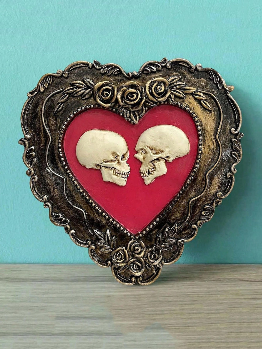 Enhance your home decor with this unique Love Tree Resin Statue &amp; Framed Micro Realistic Human Skull Gothic Wall Art Decor Set. Made with high-quality materials, this set adds a touch of gothic charm to any room. The intricate details of the skull and the beautiful love tree design make for a one-of-a-kind piece that is sure to impress.