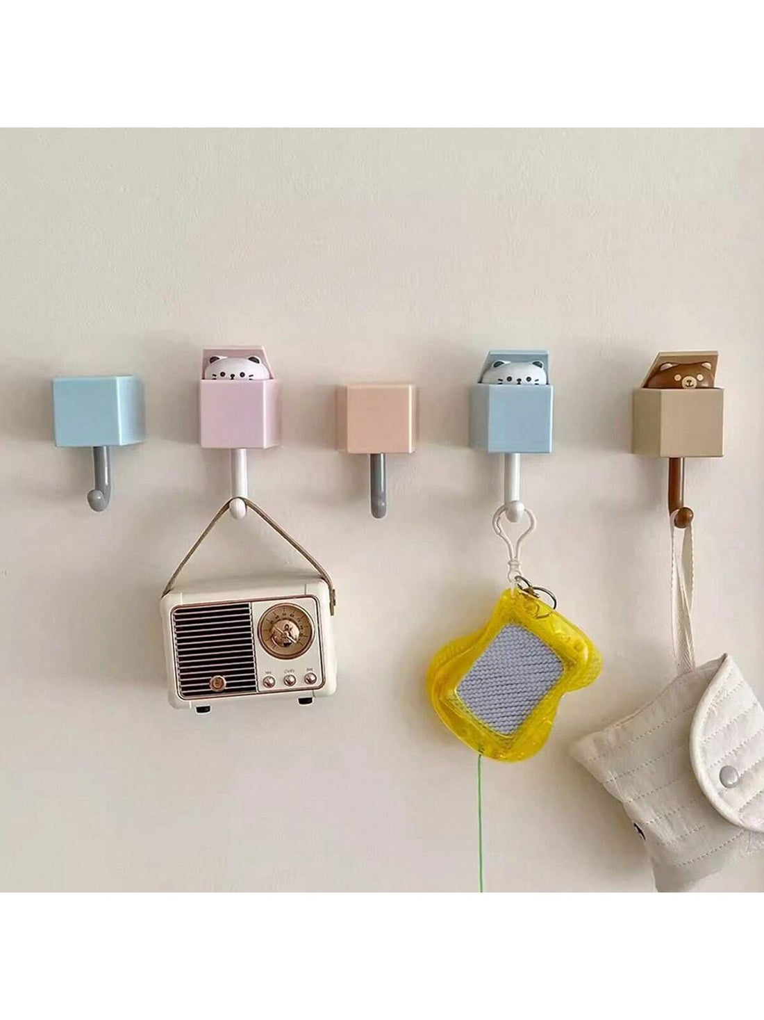 Enhance your home decor with these adorable cat-themed wall hooks. Made with waterproof materials, these cute and decorative hangers are perfect for organizing any room. Each hook is designed with attention to detail, adding a touch of charm to your space while keeping it tidy.