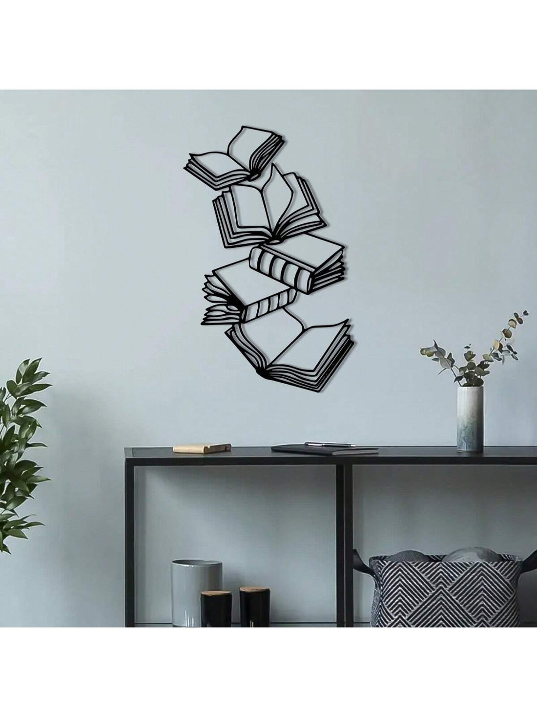 Enhance your home decor with Literary Charms, a collection of book-themed metal wall art perfect for any book enthusiast. Made with durable metal, these charming pieces add a unique touch to any room. Display your love for literature in a sophisticated and stylish way.