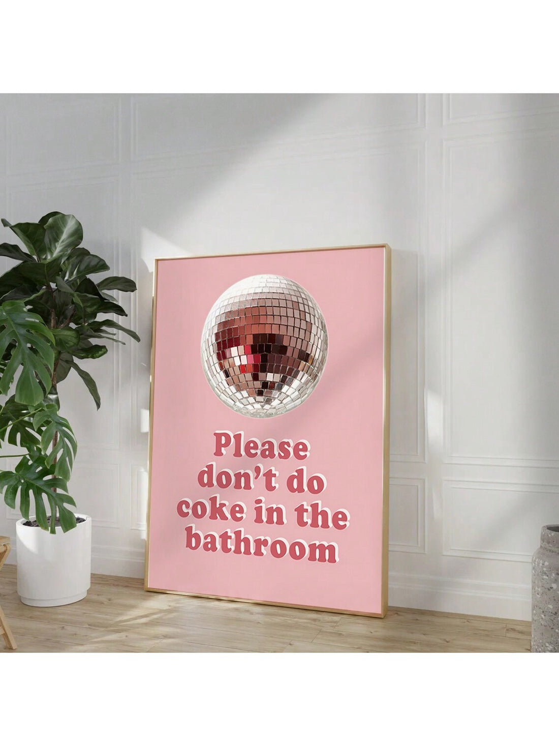 Add a playful touch to your home with this Retro Pink Wall Art Print featuring the cheeky phrase "Please Don't Do It In The Bathroom." Printed on high-quality canvas, this vibrant piece combines bold typography with a funky pink palette, perfect for injecting personality into any room. Its durable construction ensures lasting color and style, making it an ideal choice for those seeking unique, expert-level home decor that sparks conversation.
