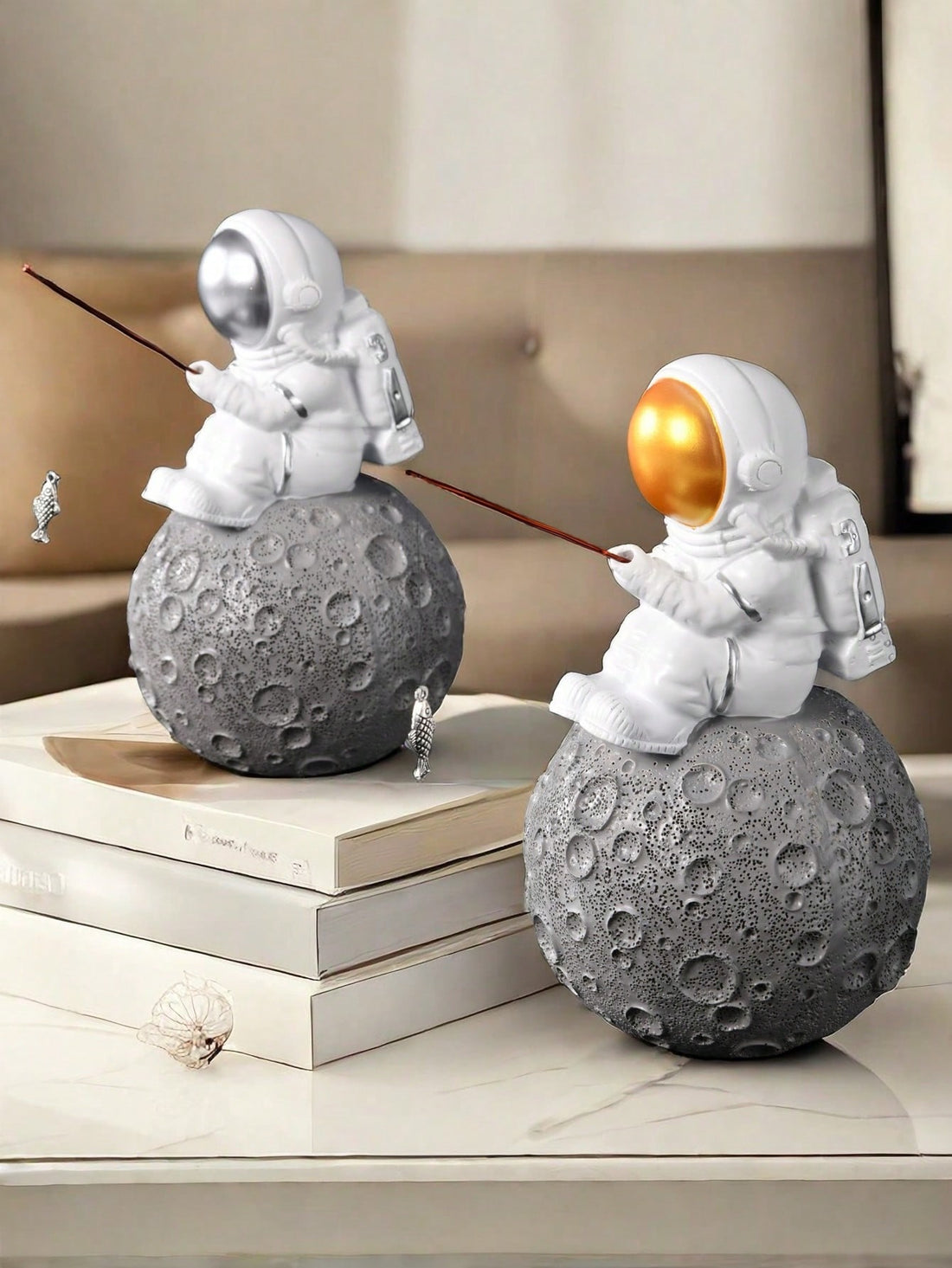 This stunning Silver Spaceman Sculpture is a must-have addition to any home decor collection. Crafted with detail in mind, its sleek design adds an astronomical touch to any space. Made with high-quality silver, this sculpture is not only visually appealing but also durable. Elevate your home decor with this unique piece.