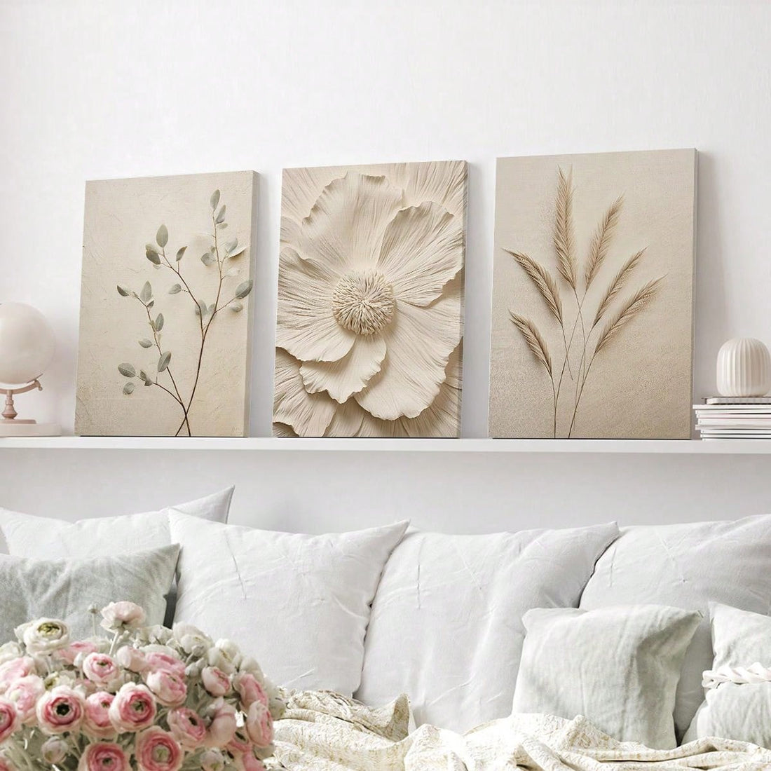 Enhance your modern living room with this 3-piece canvas wall art set featuring trendy beige botanical prints. Each decorative poster is carefully crafted on high-quality canvas to add a touch of elegance to your space. Elevate your home decor with this stylish and versatile set.