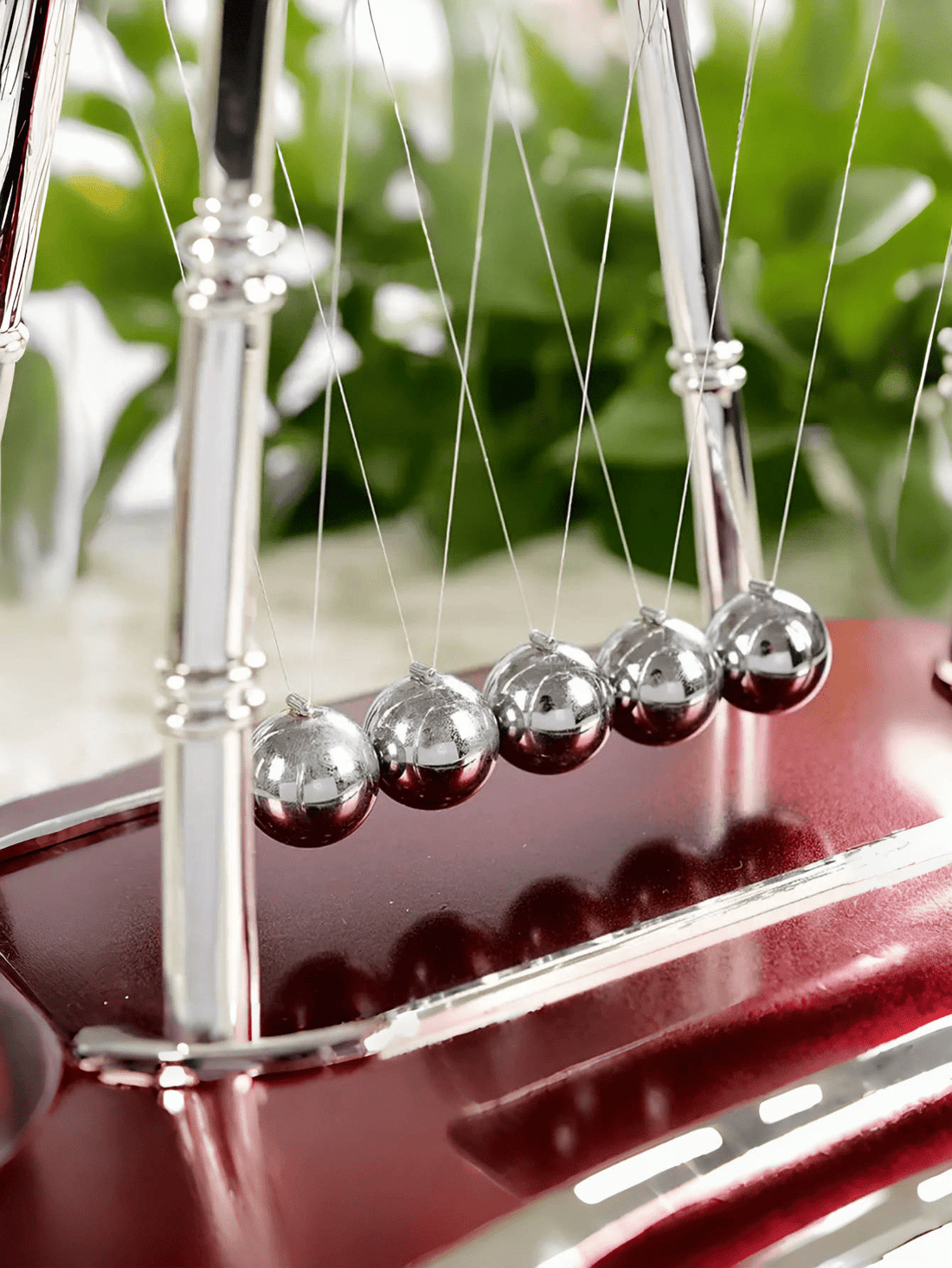 This Newton's Cradle Balance Toy is a must-have for any office space. With its unique design, it serves as both a decorative piece and a stress-relieving toy. Perfect for innovators looking for a creative outlet, this toy is a reminder of Newton's laws of motion and the balance needed for success.