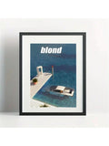 Styled display of retro poster art for a modern home office