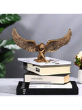 Size graphic showing angel wing ornament about 17 cm wide and 10 cm tall.