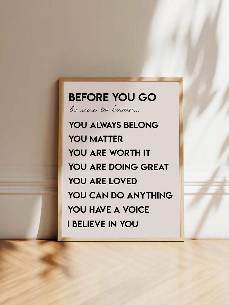 Natural wood framed Before You Go affirmation print in a sunlit room