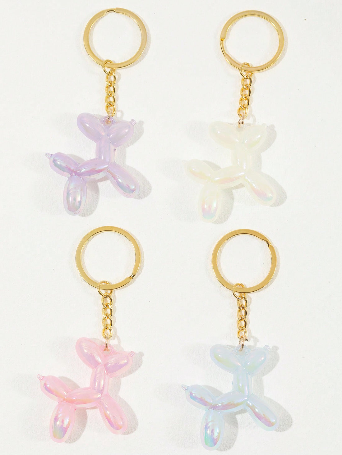 Elevate your style with our Adorable Balloon Dog Keychain! This cute accessory is perfect for adding a touch of personality to your bags and keys. Crafted with high-quality materials, it is designed to be both durable and stylish. A must-have for any dog lover!