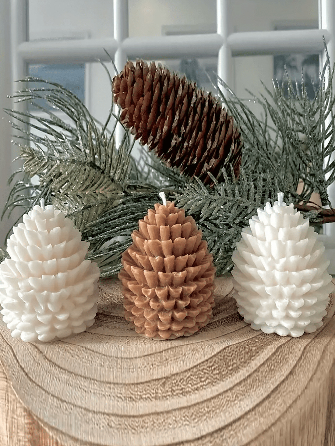 Elevate your home decor with our Handmade Pinecone Candle. Expertly crafted and versatile for all occasions, this elegant candle will add a touch of natural beauty to any room. Made of premium materials, it will provide a long lasting burn, giving your space a warm and inviting ambience.