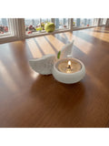 Measurement graphic showing candle holder about 10 cm wide, 6 cm deep, and 3.5 cm high.