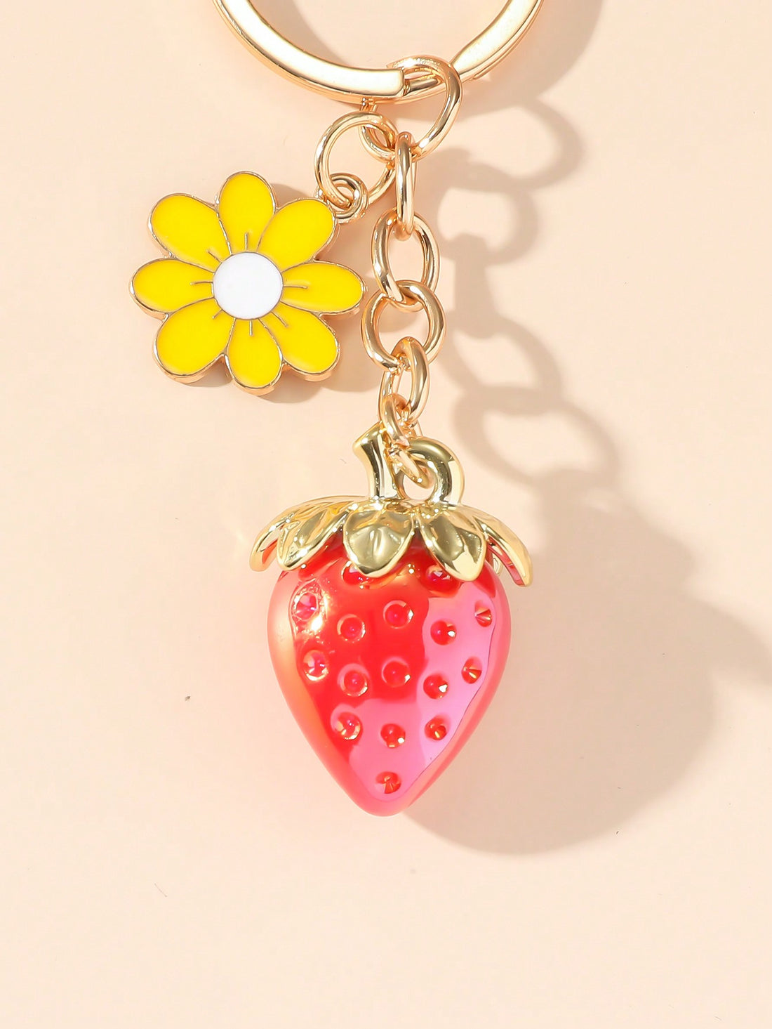 Introducing the Charming Strawberry Flower Keychain - a cute, transparent fruit style accessory for her. Made with high-quality materials, this keychain will add a touch of charm to any purse or set of keys. Perfect as a gift for the special someone in your life.