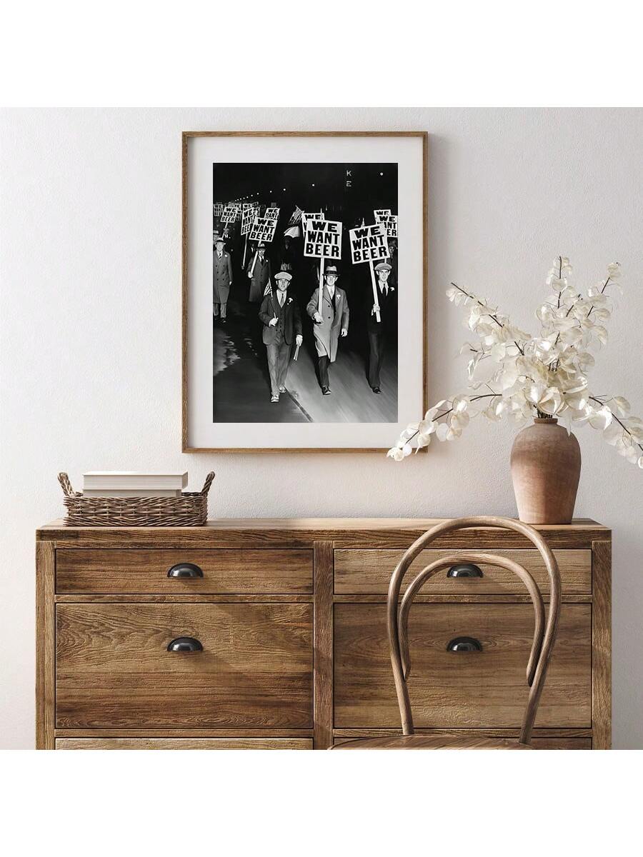 This vintage black and white wall art features a 'We Want Beer' Prohibition design, perfect for beer lovers. Made from high-quality canvas, it adds a touch of nostalgia to your space. Bring the past to life with this unique and stylish decor piece.