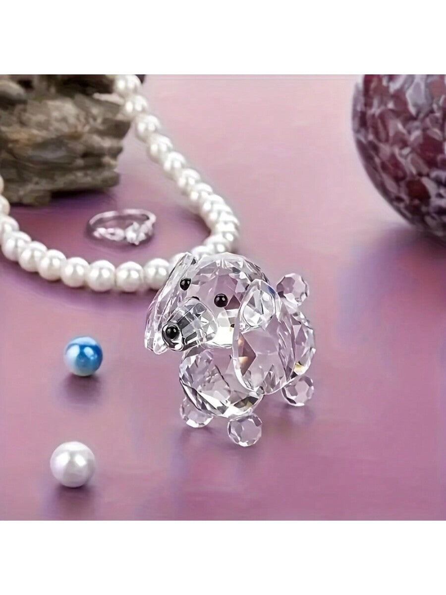 This handcrafted crystal dachshund figurine is a charming addition to any home or office decor. Made with elegant glass, this statue adds a touch of sophistication to any room. Display it proudly and admire the exquisite craftsmanship put into every detail. Perfect for dog lovers and collectors alike.