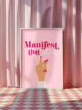 Manifest That Shit wall art in light wood frame near curtains