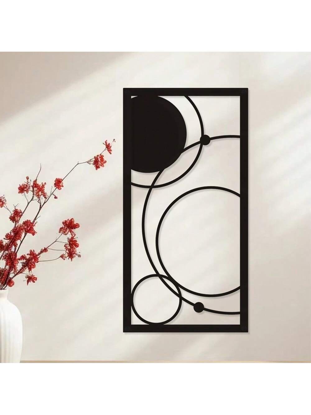 This modern black geometric metal wall art adds a touch of sophistication to any interior. Designed with minimalist abstract patterns, this piece is a perfect statement piece for a chic and elegant home. Its sturdy metal construction also ensures durability and longevity. Elevate your home decor with this unique and stylish wall art.