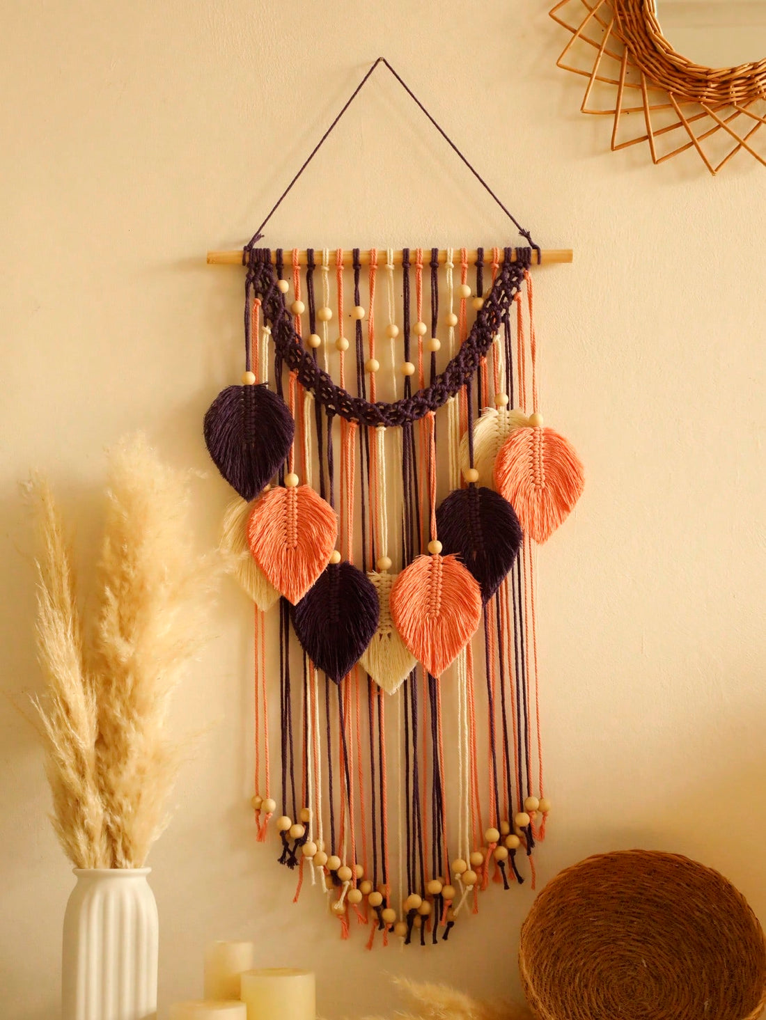 Elevate your living space with our Chic Boho Macrame Leaves Wall Hanging. Handcrafted with intricate weaving techniques, this tapestry adds a stylish touch to any room. Made from high-quality materials, our beautiful decor piece is durable and versatile. Bring nature indoors with the stunning macrame leaf design.