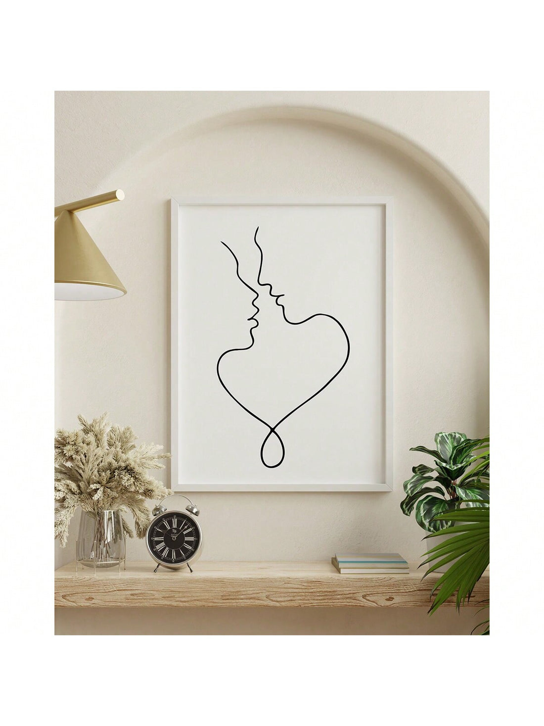 This framed canvas print features a minimalist design of a couple kissing, adding a touch of romance to any home. Made with high-quality materials, it is perfect for stylish and modern home decor. Incorporate a sense of intimacy to your space with this elegant and timeless art piece.