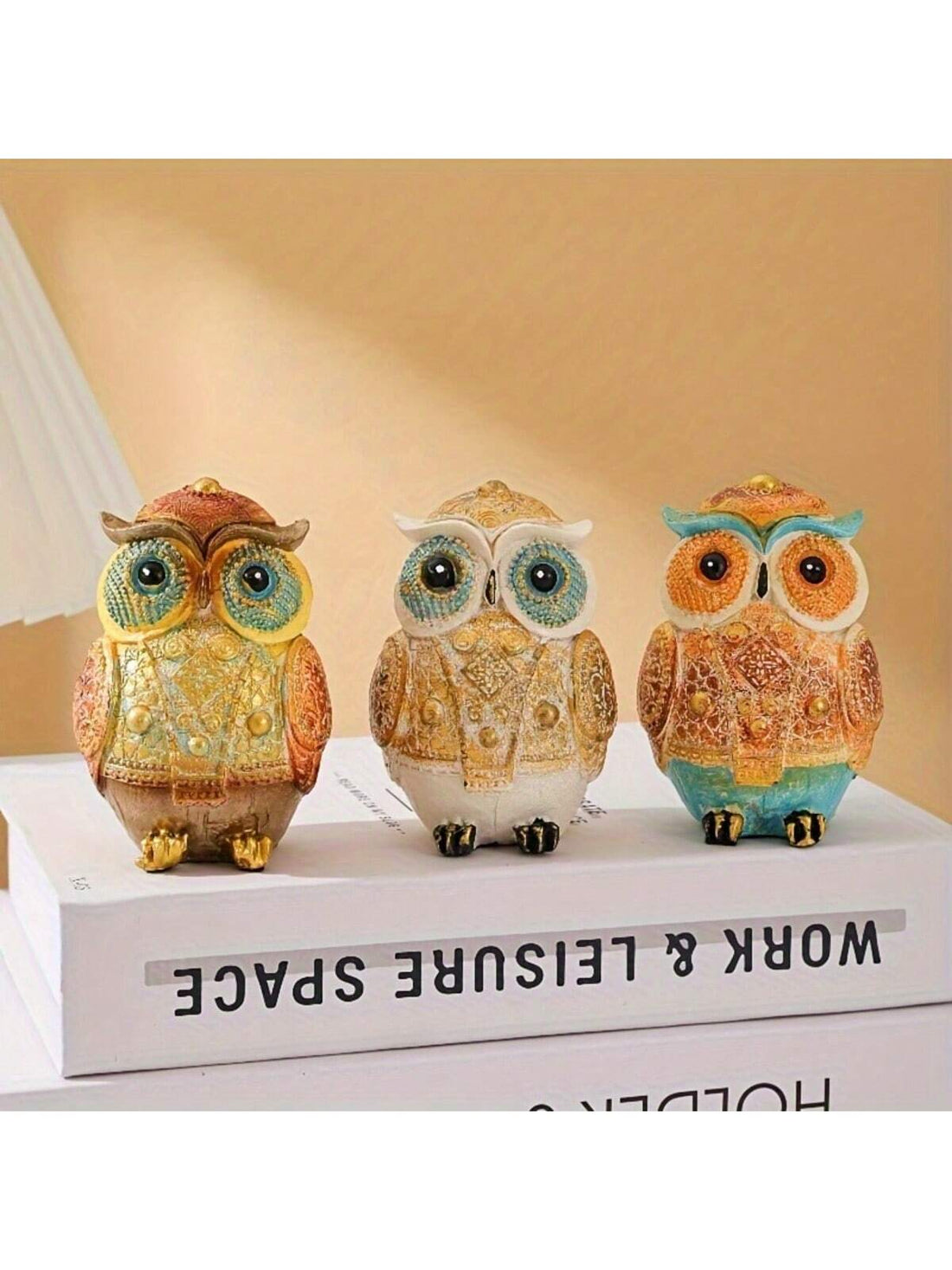 This charming handmade owl resin ornament is the perfect addition to any home decor, adding a touch of whimsy and personality. With its intricate details and expert craftsmanship, it also makes for a thoughtful and unique gift for any owl lover. Add a touch of charm to your home or surprise a loved one with this delightful ornament.