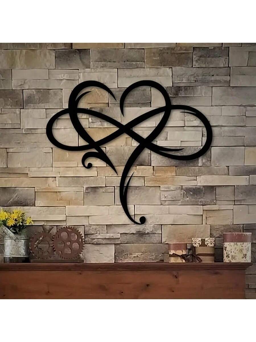 Introduce timeless elegance to any space with our Endless Love: Black Infinity Heart Metal Wall Decor. Made with durable metal, this eye-catching piece features a sleek, black infinity heart design that symbolizes everlasting love. Perfect for adding a touch of sophistication and sentimentality to your home.