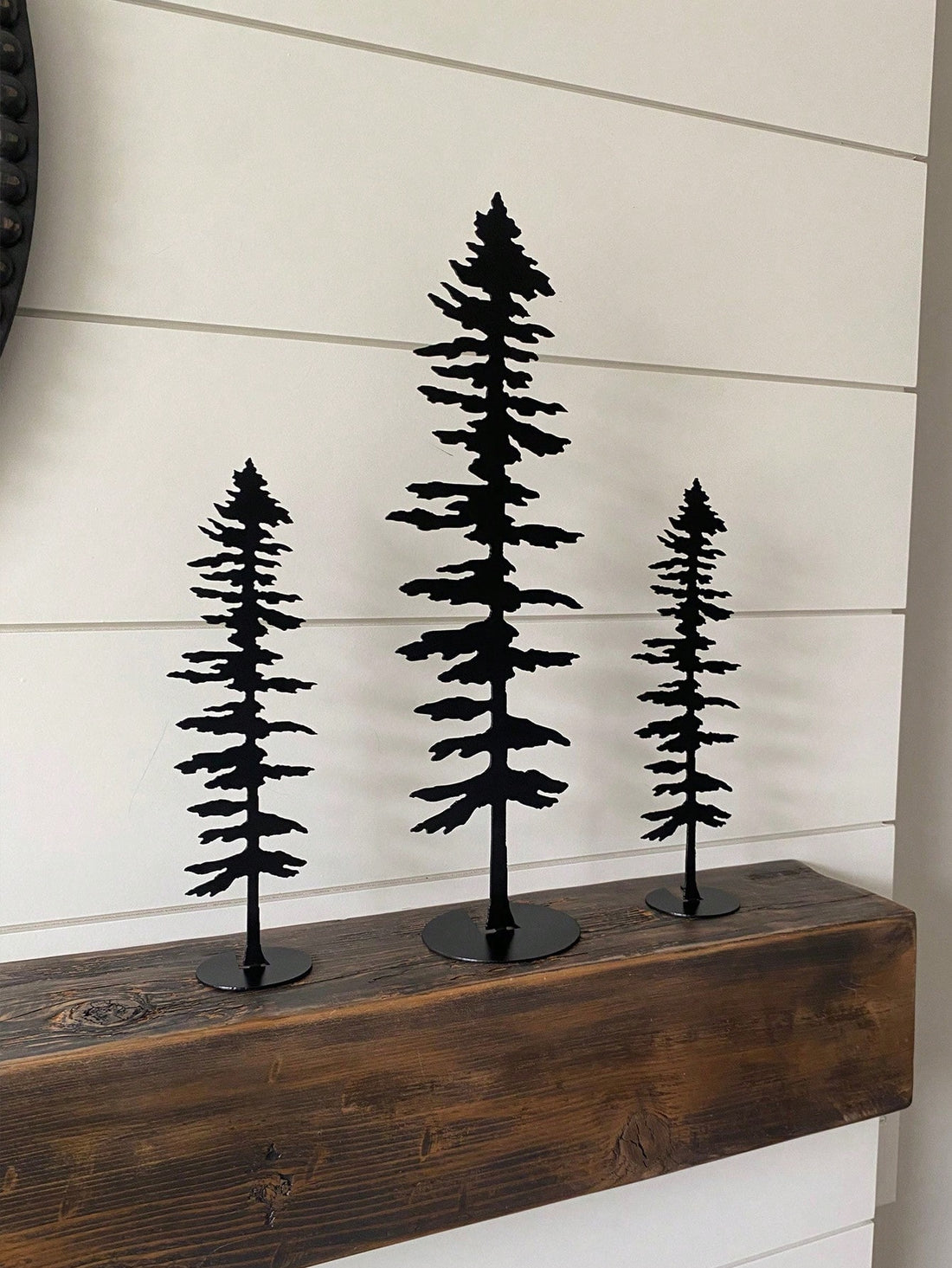 Create a nature-inspired and elegant home decor with our 3-Piece Sitka Tree Metal Wall Art Set. These beautifully crafted pieces will enhance any room's ambiance with their intricate details and unique design. Made with high-quality metal, this set is durable and long-lasting, ensuring a timeless addition to your home.