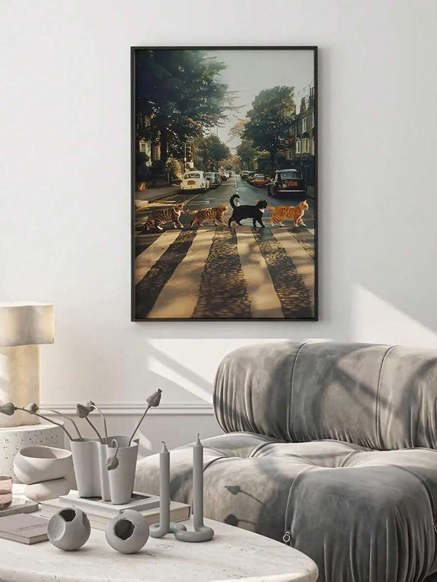 Large black framed print of cats crossing city street