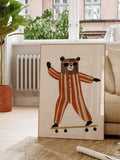 Playful framed bear poster with rust orange outfit muted blue accents and pale wood frame