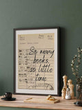 Dark framed vintage library quote print above a cozy kitchen counter
