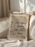 Vintage library card book quote print framed on a sunlit cream bed