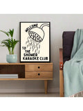 Playful shower karaoke poster in black frame beside plants