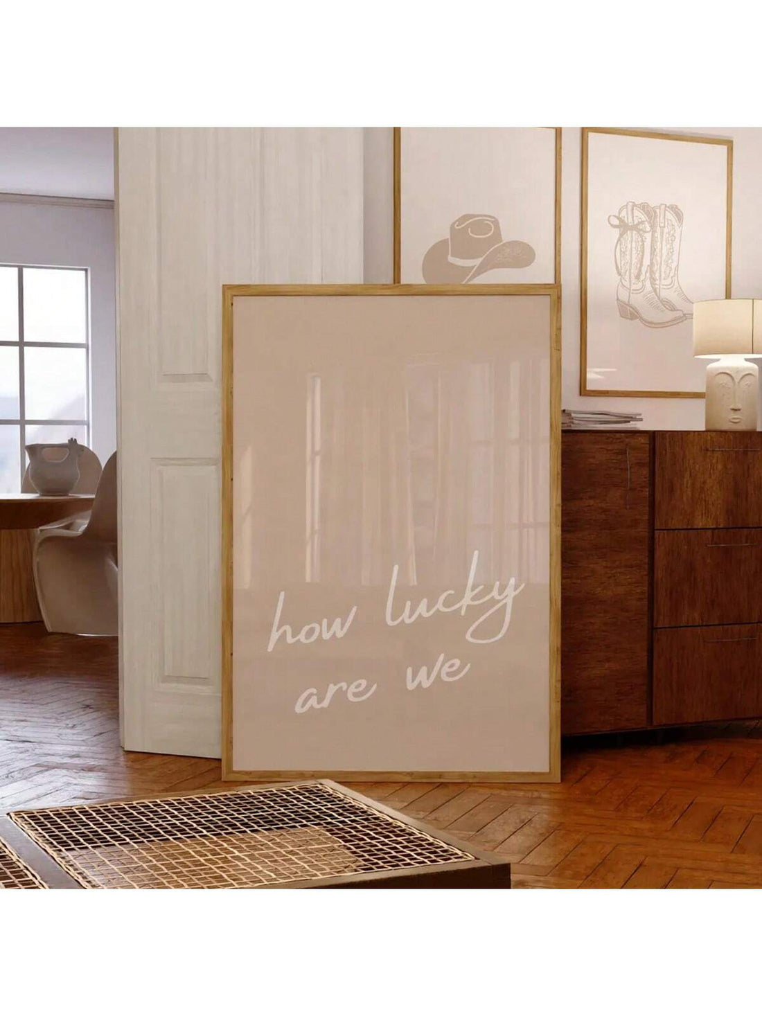 Elevate your home's style with our Modern Minimalist 'How Lucky Are We' Wall Art Print. Featuring a sleek design and motivating message, this print adds a touch of sophistication to any space. Perfect for dorms and homes alike, it serves as a constant reminder to appreciate what we have.