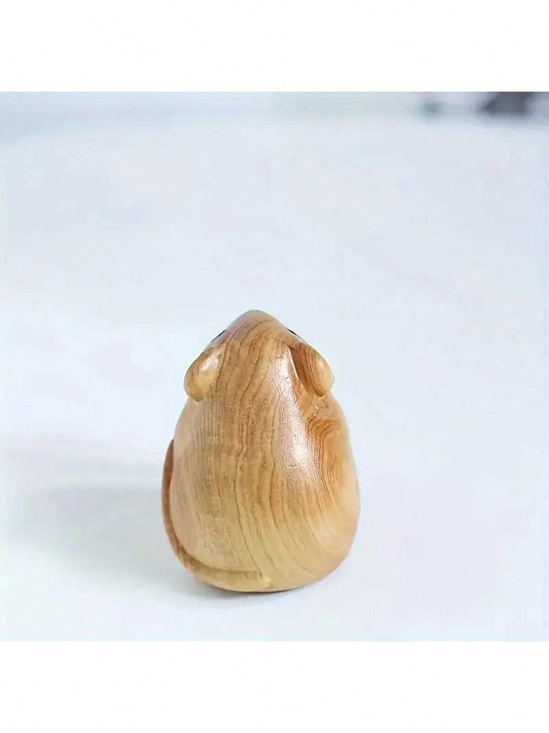 Add a touch of whimsy and charm to your home decor with this beautiful Charming Handmade Wooden Mouse Figurine. Handcrafted with care, this vintage sculpture will add a unique and rustic accent to any room. Perfect for seasonal decorating or as a permanent addition to your home.