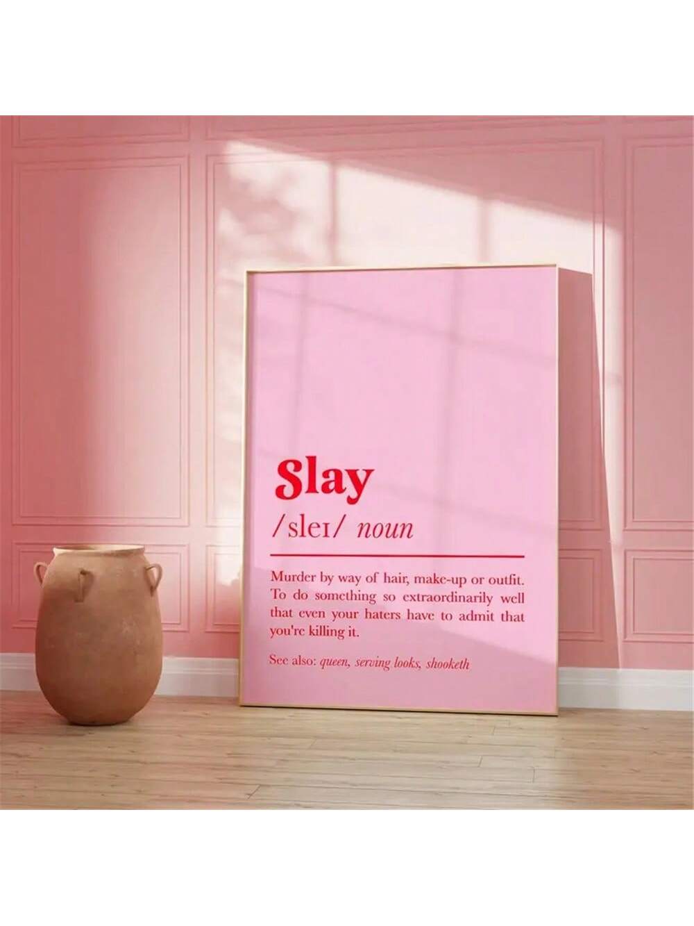 Make a bold statement with this striking canvas print featuring the word "SLAY" paired with its empowering definition. The minimalist design combines vibrant pink and red tones against a clean background, creating an eye-catching focal point that celebrates confidence and self-assurance. Perfect for bedrooms, offices, or living spaces, this modern wall art adds personality and motivation to any room. High-quality canvas construction ensures lasting color vibrancy and durability. An ideal gift for anyone who