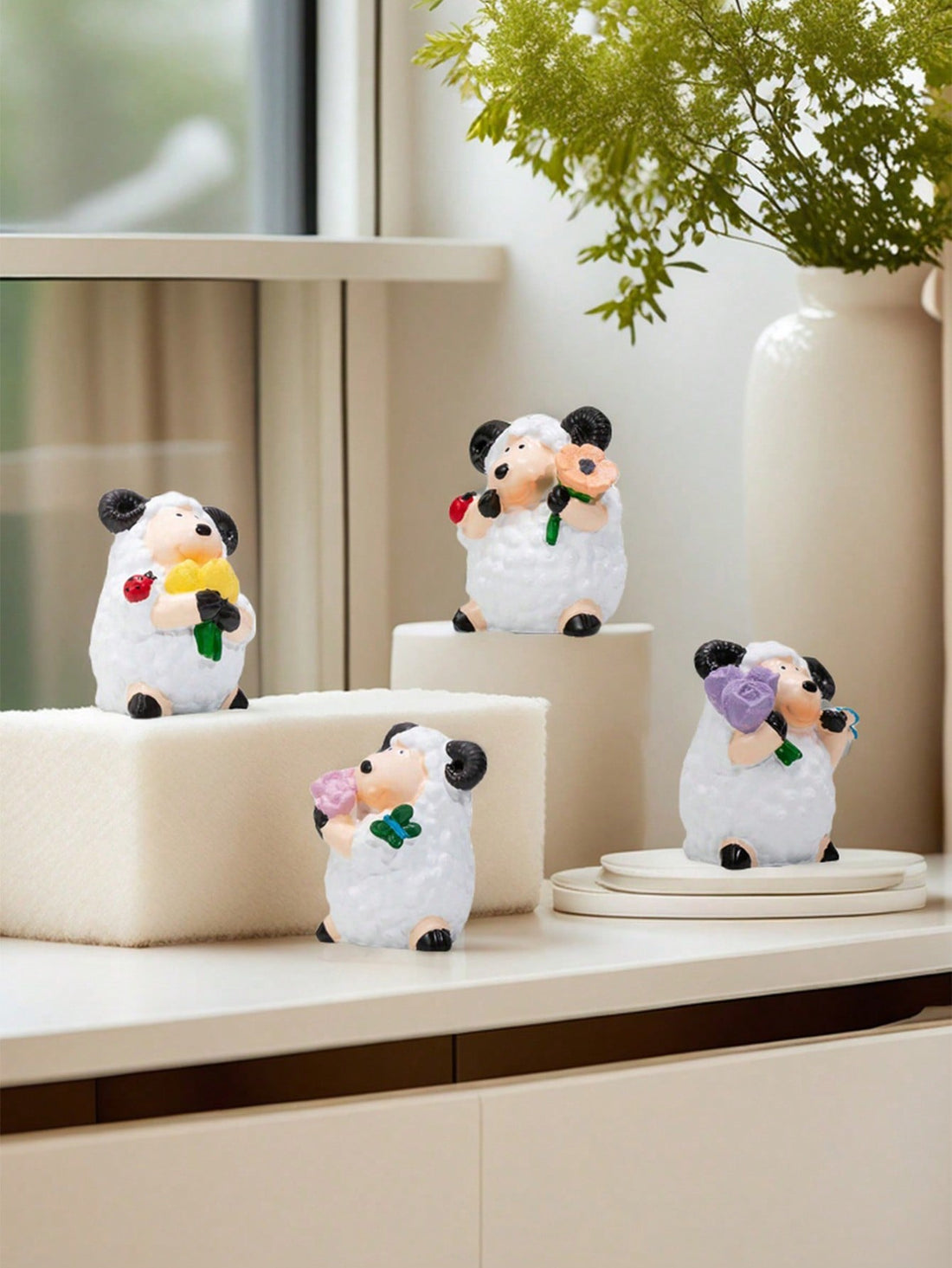 Introducing the Charming Flower Lamb Resin Decorative Ornament, perfect for elegant home décor and gift giving. This beautifully crafted lamb ornament adds charm and sophistication to any space. Made from high-quality resin, it is a durable and timeless decoration that will enhance the aesthetic of any room.