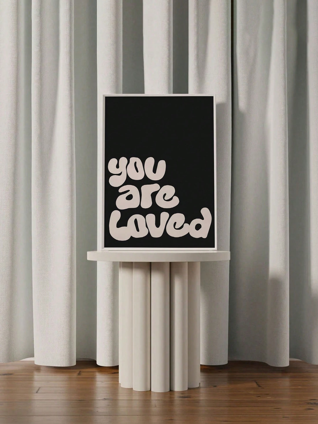 Elevate your home decor with our "You Are Loved" Black Affirmation Poster. This motivational wall art serves as a daily reminder of your worth, bringing positivity and inspiration to any room. Made with neutral colors, it seamlessly fits into any home aesthetic. Show yourself love with this powerful and uplifting piece.