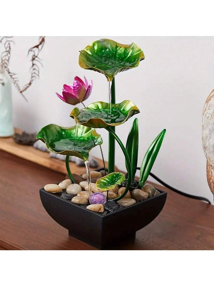 Gold tabletop lotus waterfall fountain with black basin, stones, pump, and size labels.