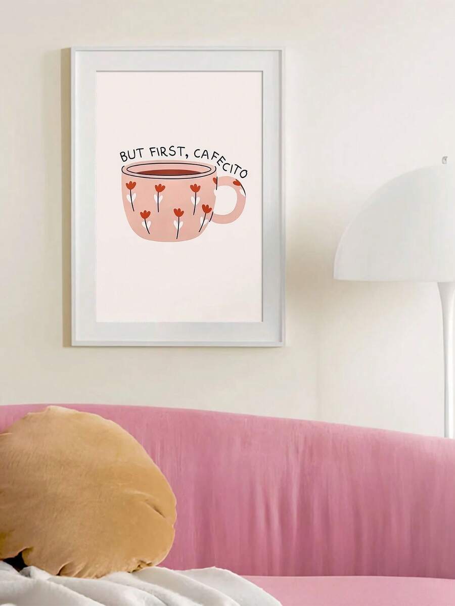 Pink floral cafecito poster in a white frame above a pink sofa