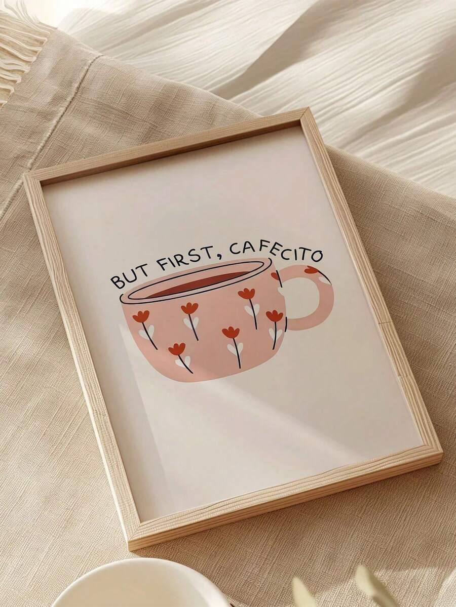 But first cafecito floral coffee cup poster shown in a wood frame