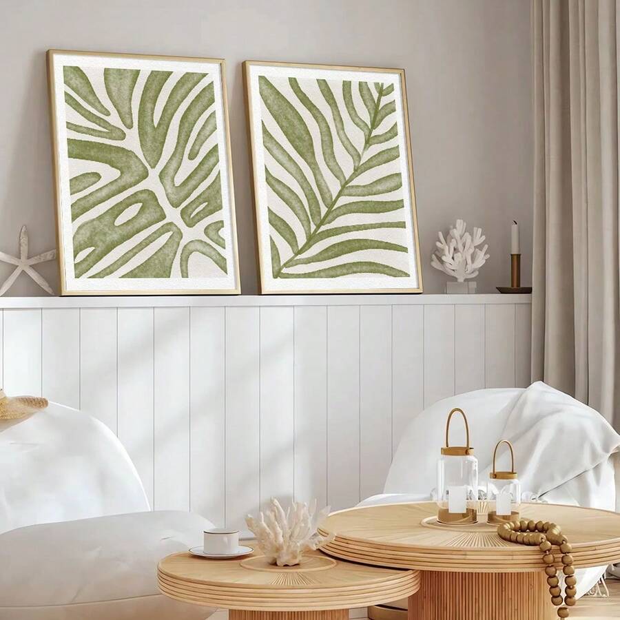 Transform your walls with this elegant set of 2 boho botanical prints featuring minimalist green leaf designs. Perfect for creating a serene, nature-inspired atmosphere in any room—from your living room and bedroom to your home office or kitchen.