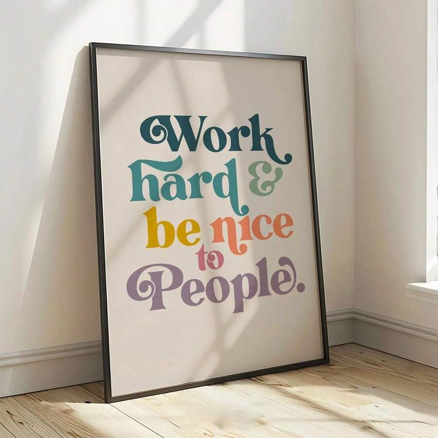 Colorful work hard and be kind quote print in a sunlit room