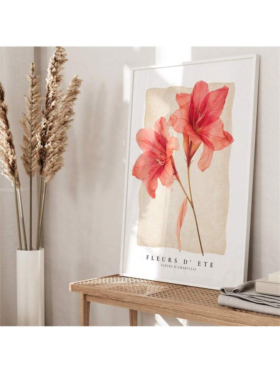 Framed coral amaryllis botanical print with FLEURS D’ ETE and FLEURS D’AMARYLLIS text on a console