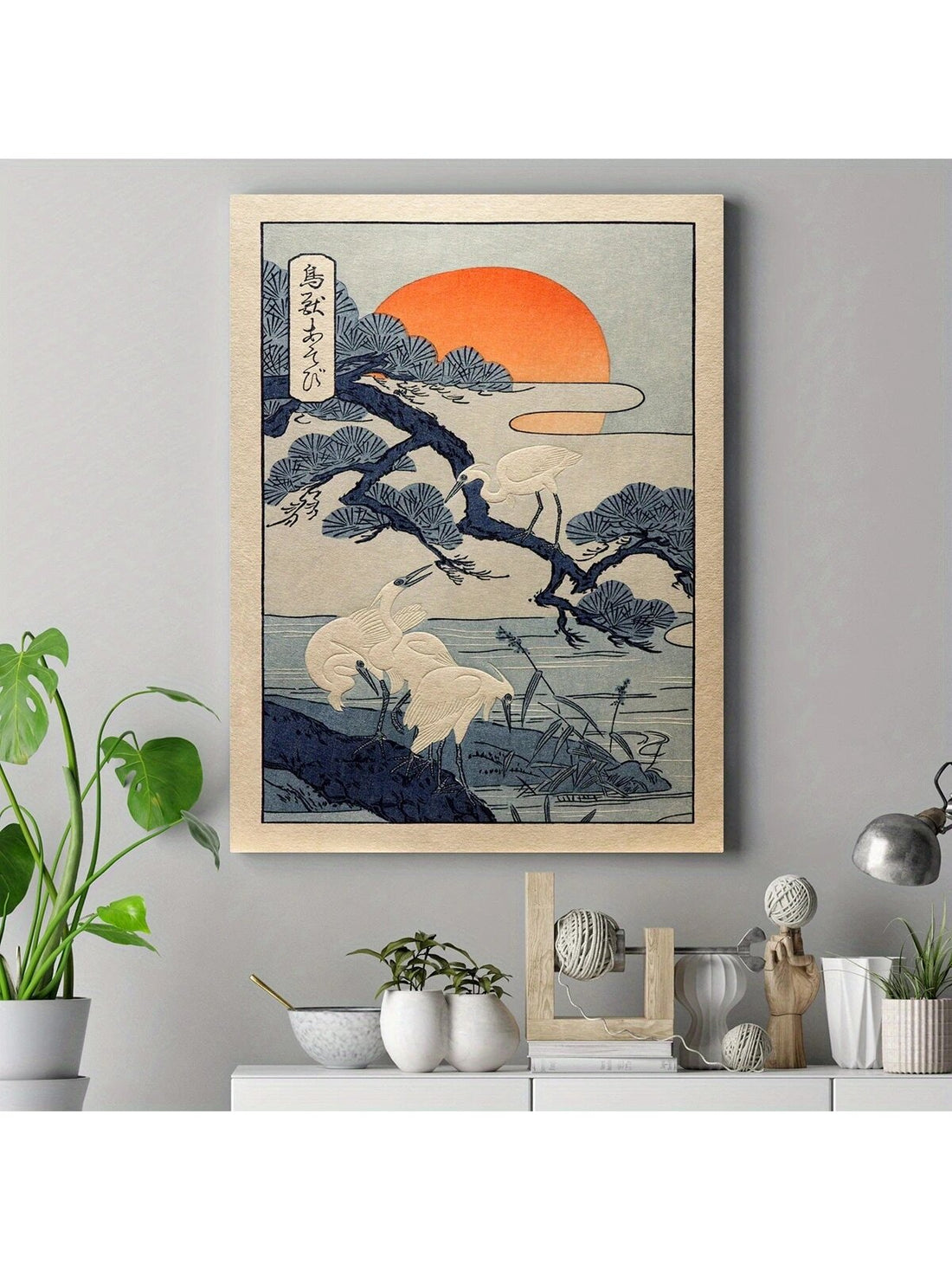 Transport your space into a realm of tranquility with this exquisite Ukiyo-e-inspired canvas art. Featuring a masterfully rendered Japanese landscape where graceful cranes glide among towering pine trees, this piece captures the essence of traditional woodblock artistry. The sophisticated composition balances negative space with intricate detail, creating visual depth that commands attention without overwhelming. Ideal for discerning collectors and those seeking authentic cultural aesthetics, this canvas el